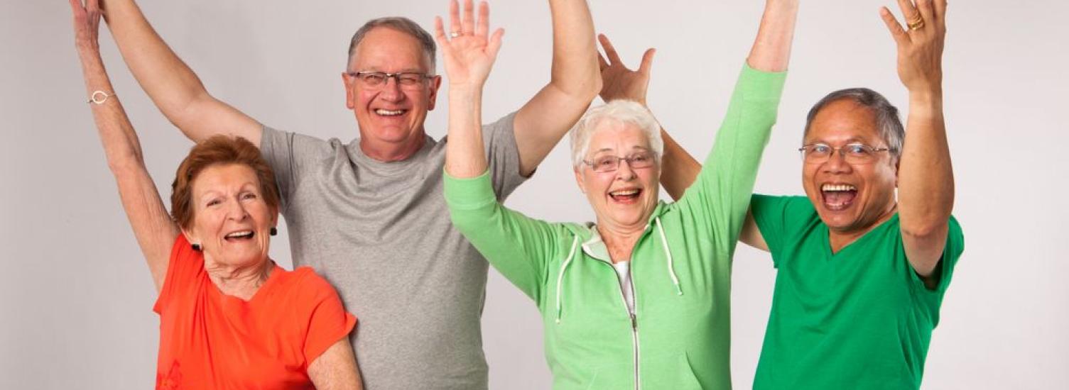 Image of Senior Citizens with hands up.